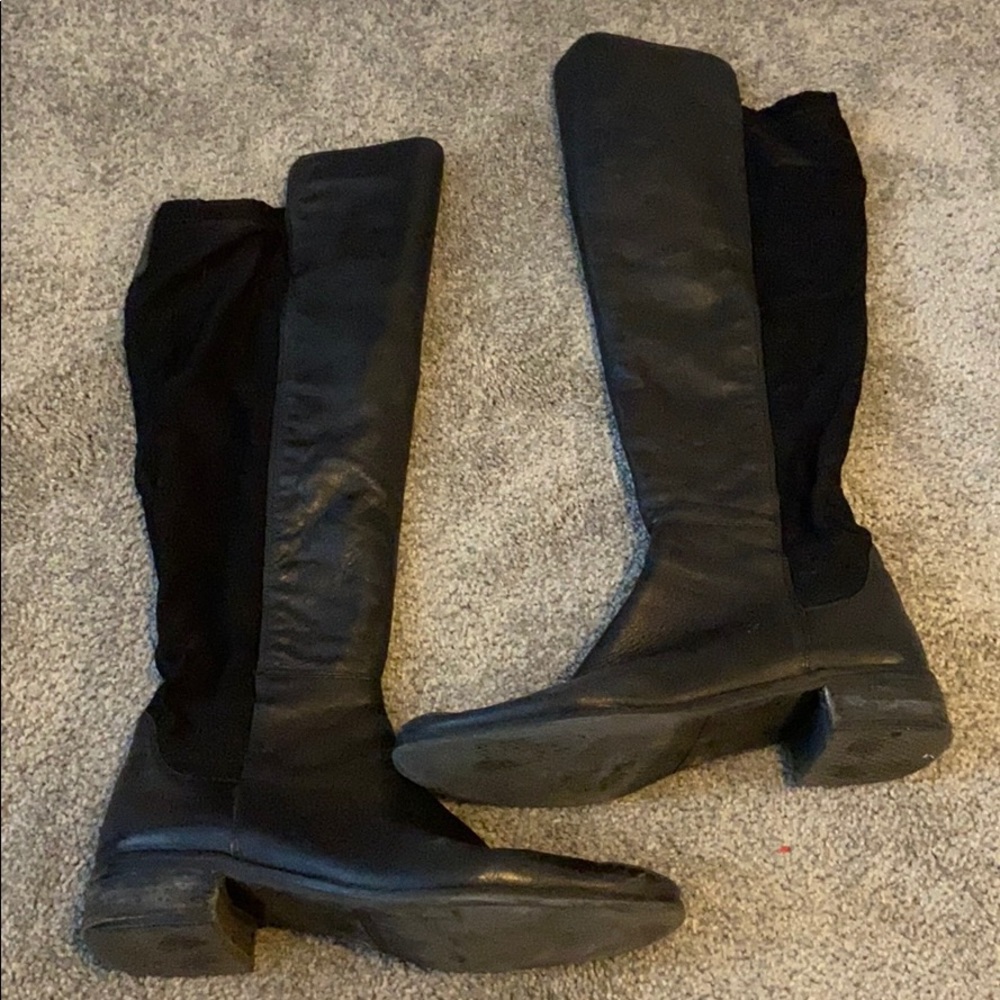 Tall black leather booths